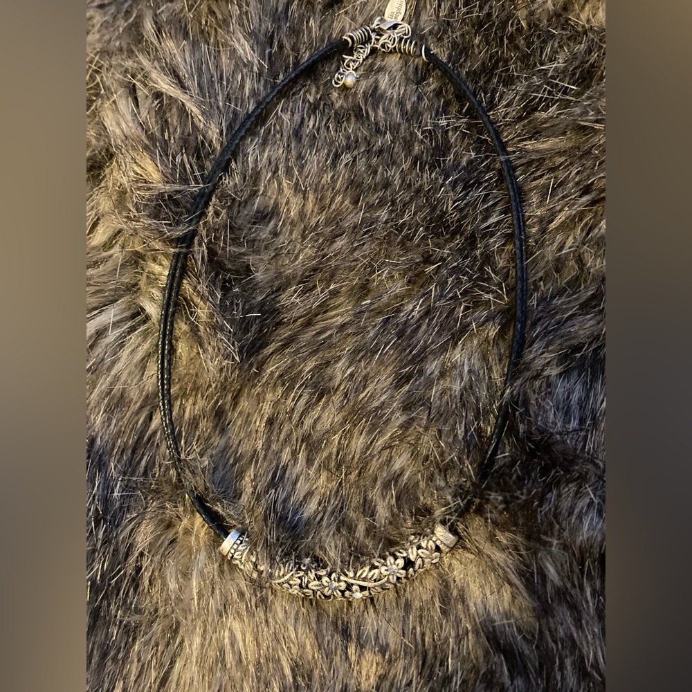 Lia Sophia necklace that completes a look in silver and black with a sparkle